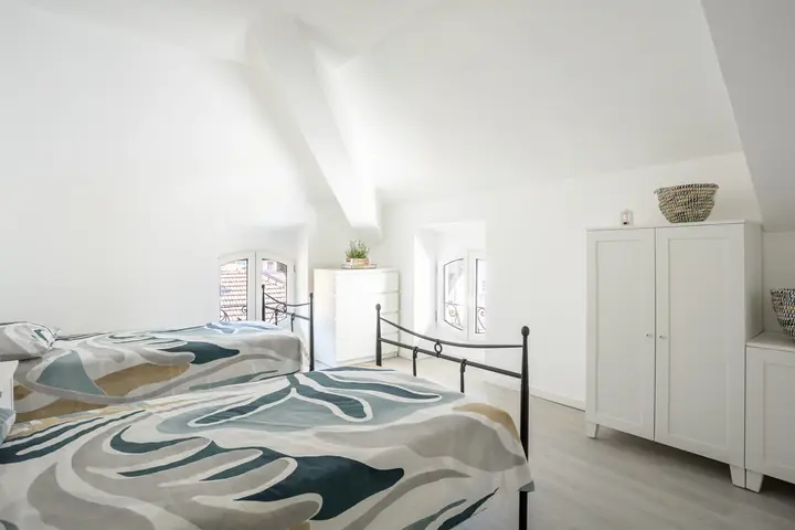 Second bedroom with two single beds